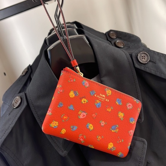 Coach Handbags - Coach Corner Zip Wristlet With Mini Vintage Rose Print
IM/Miami Red Multi